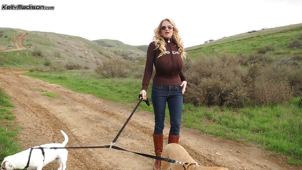 Milf amateur Kelly Madison is having a nice walk with her dogs
