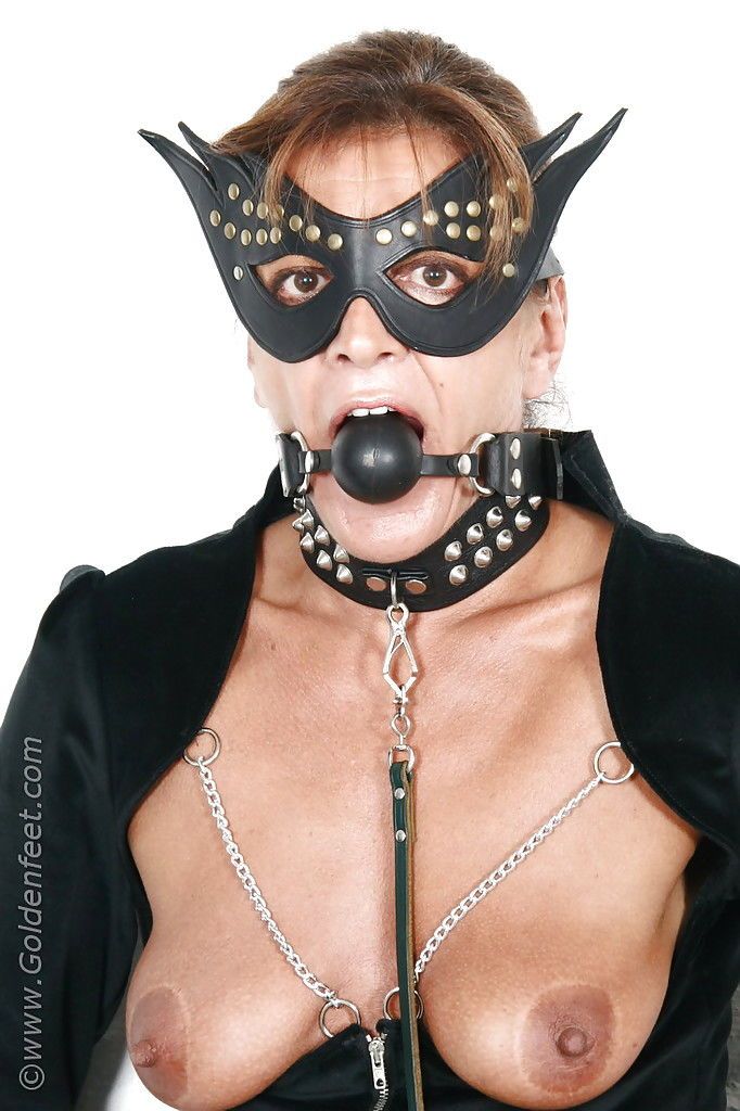 Kinky mature UK BDSM model Lady Sarah flashing pierced upskirt pussy