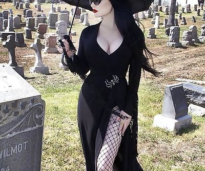 Slutty goth bimbo at a graveyard
