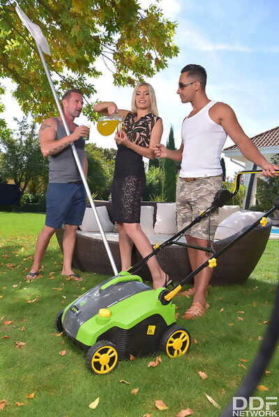Blonde housewife Kitana Lure does a DP in the yard with the maintenance men