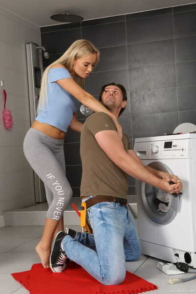Kinky blonde Victoria Pure seduces the repairman into golden shower action