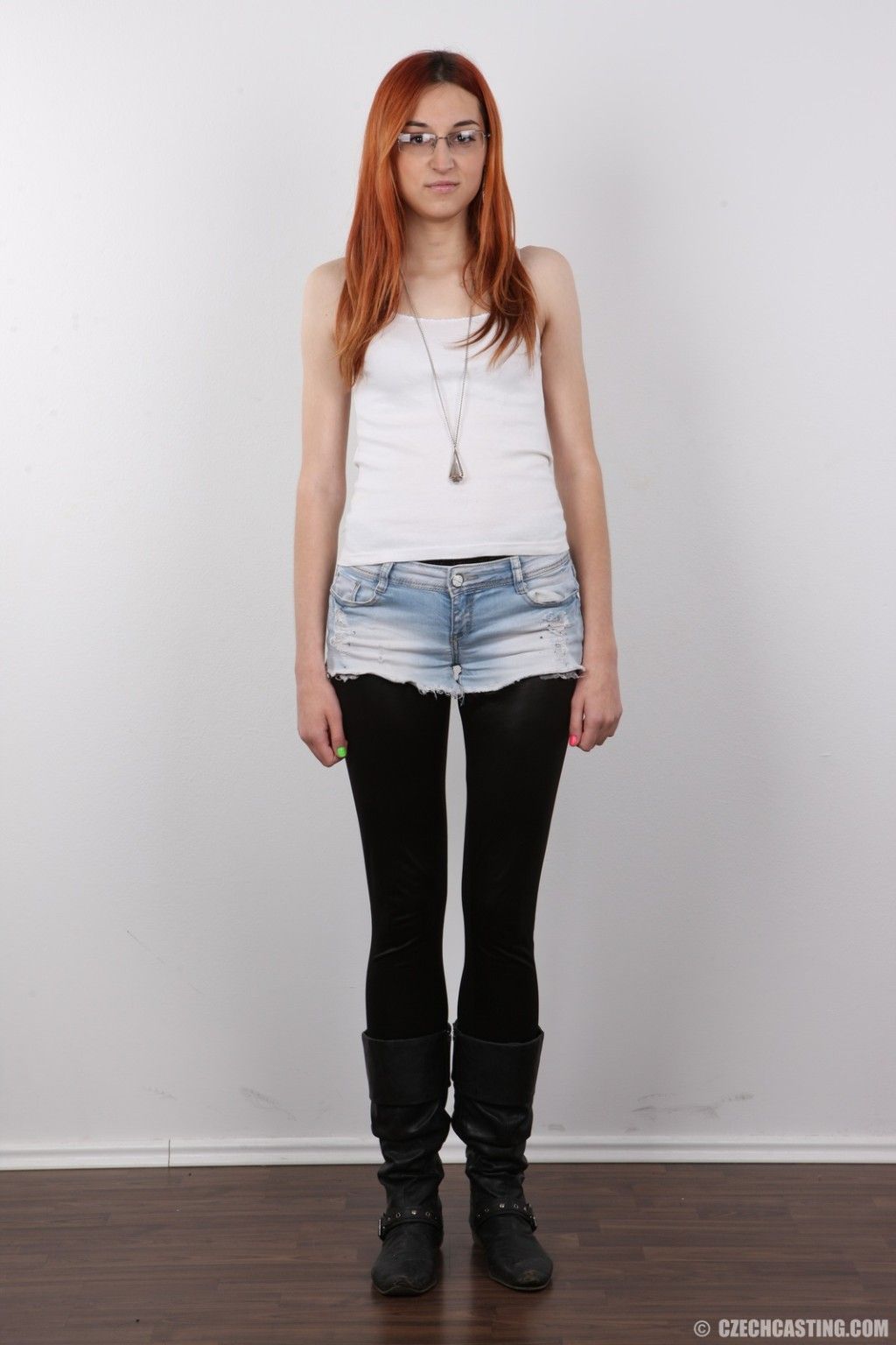 This ginger head has the longest legs you\'ve seen. her speciality is blowjobs.