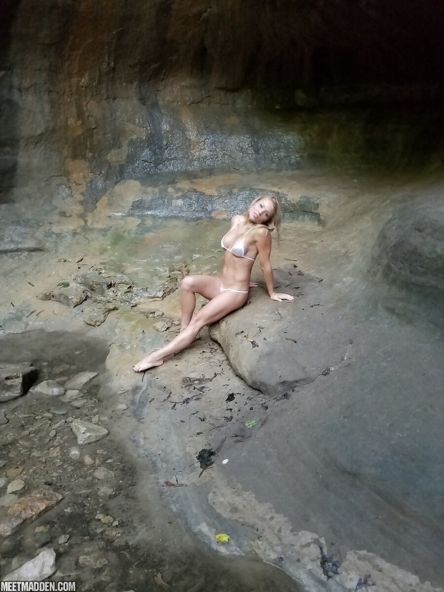 Blond amateur Meet Madden strikes hot solo poses in a bikini after backpacking