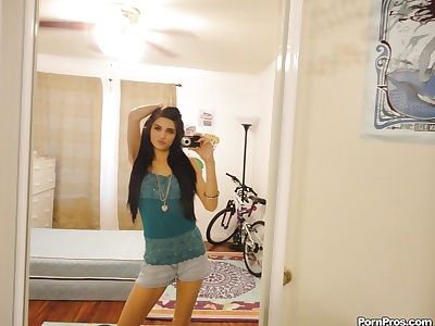 Slender female Zoey Kush ditching her shorts and top while taking selfies