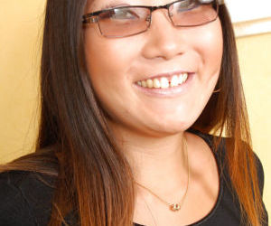 Close ups of glasses adorned Asian first timer Miki..